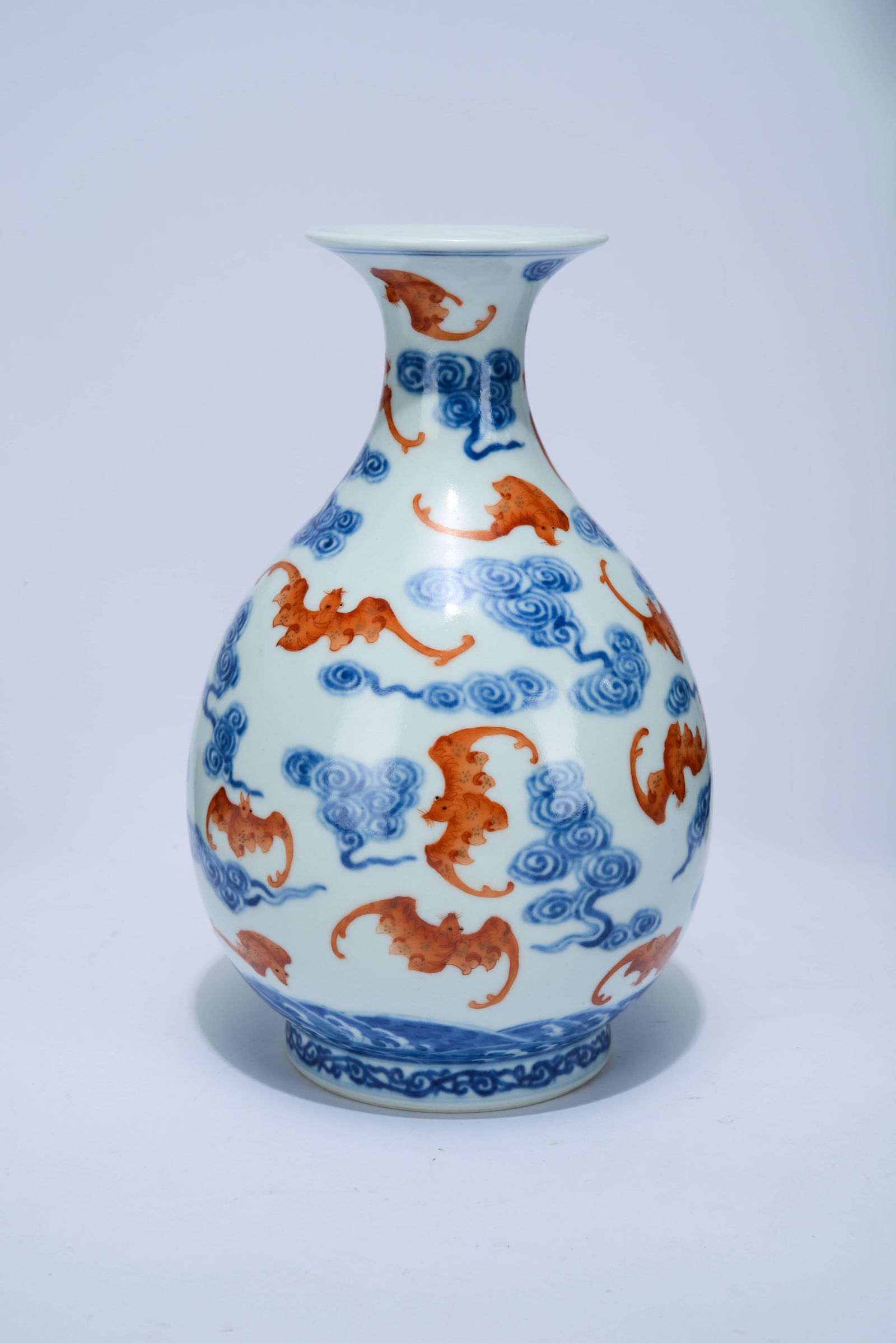 A BLUE AND WHITE AND IRON-RED
