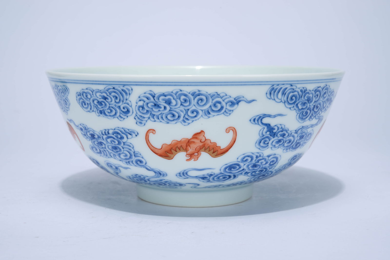 A BLUE AND WHITE AND IRON-RED