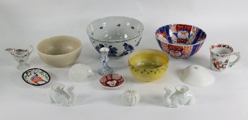 A blue and white Delft bowl painted