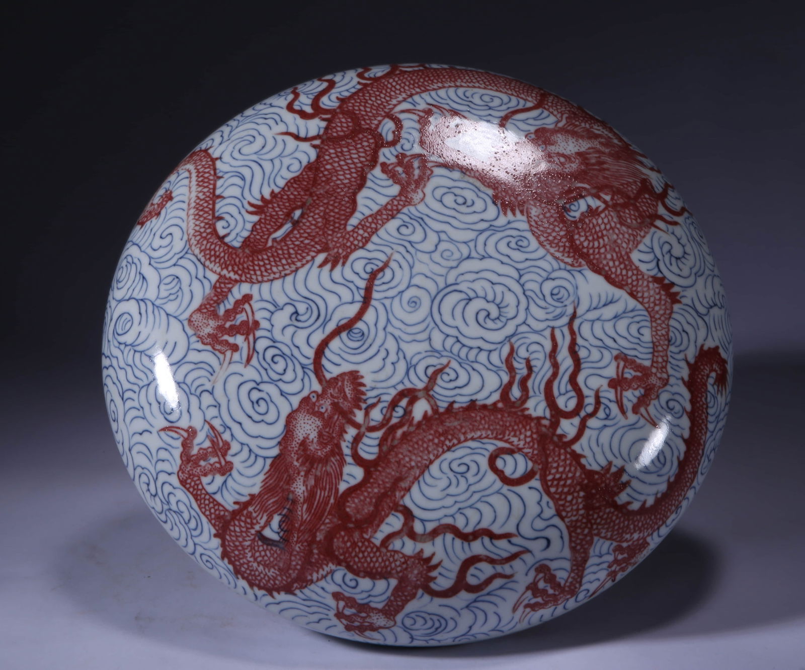 A BLUE AND WHITE WITH IRON-RED