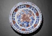 A BLUE AND WHITE WITH UNDERGLA