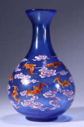 A BLUE GLASS 'BAT AND CLOUD' V
