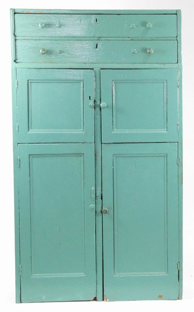 A blue painted pine cupboard fitted