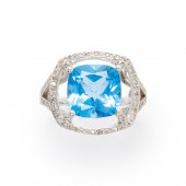 A BLUE TOPAZ, DIAMOND AND FOUR