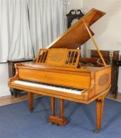 A Bluthner inlaid satinwood Al