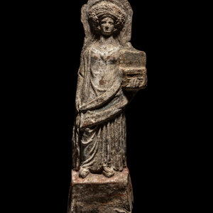 A Boeotian Terracotta Standing