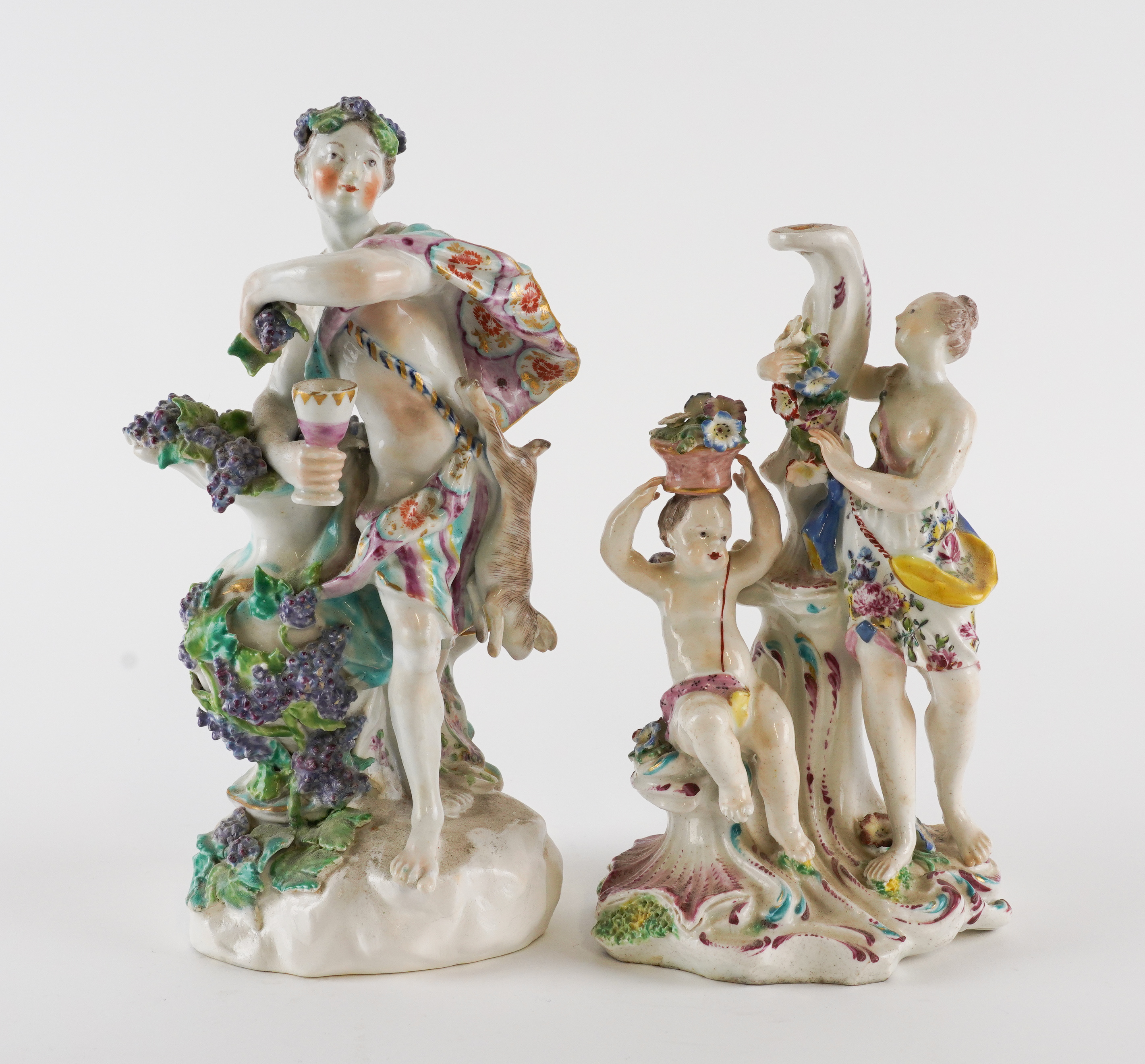 A BOW CANDLESTICK GROUP Circa