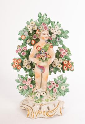 A Bow figure of a cherub with