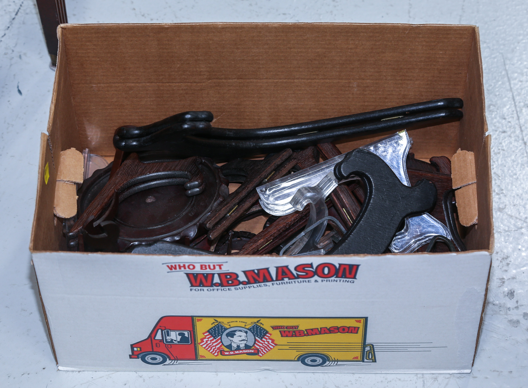 A BOX OF ITEM DISPLAY STANDS