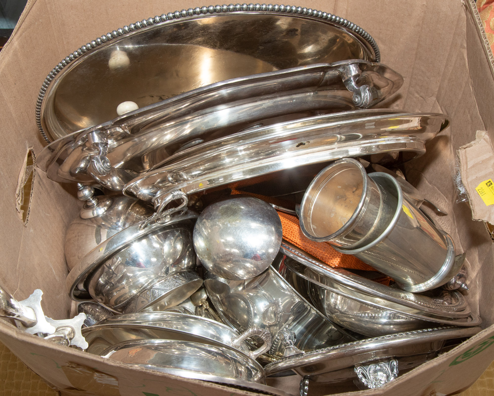 A BOX OF SILVER PLATED ITEMS