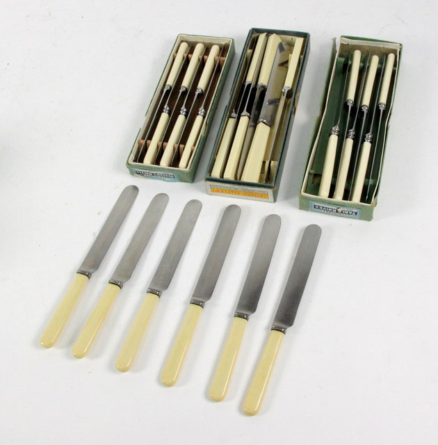 A box of six table knives another