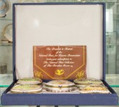 A BOXED SET OF FIVE PORCELAINE