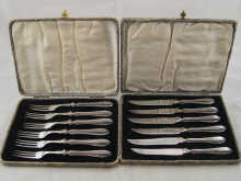 A boxed set of of six silver