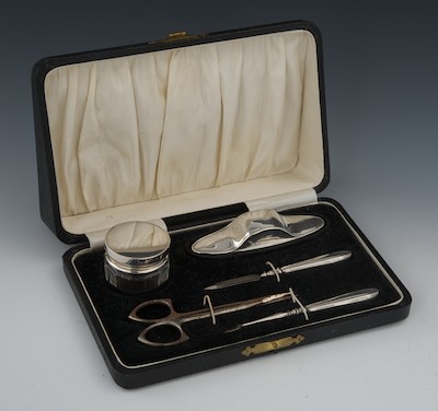 A Boxed Set of Silver Handled