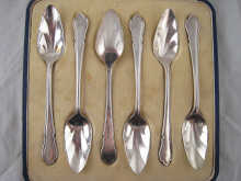 A boxed set of silver grapefruit