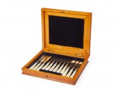 A BOXED SET OF SILVER-PLATE DE