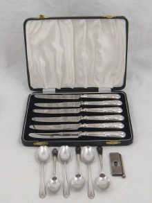 A boxed set of six silver handled