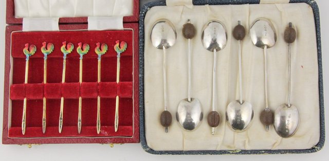 A boxed set of six silver coffee