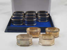 A boxed set of twelve white metal