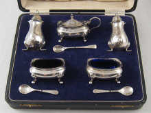 A boxed silver cruet of a pair of