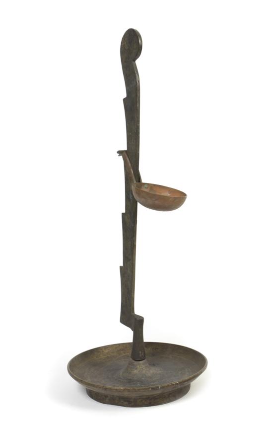 A Brass and Copper Oil Lamp