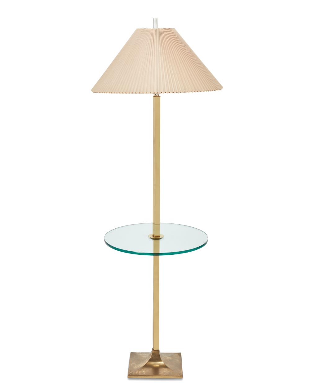 A BRASS AND GLASS FLOOR LAMPA brass