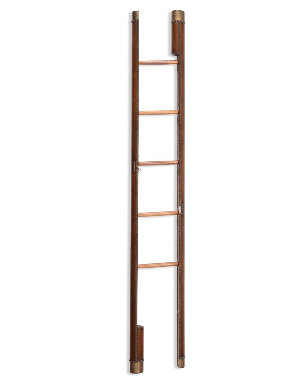 A BRASS AND LEATHER FOLDING
