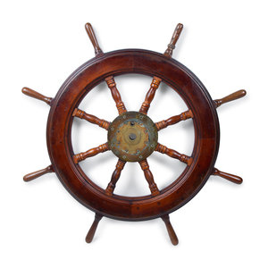 A Brass and Mahogany Ship's Wheel