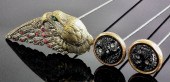 A brass and rhinestone mounted