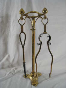 A brass Art Nouveau fireside