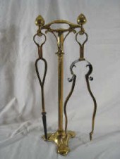 A brass Art Nouveau fireside c