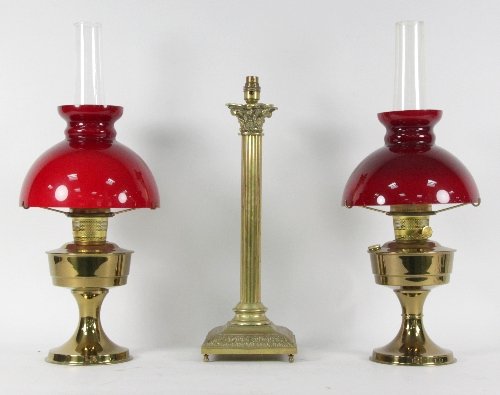 A brass Corinthian column table