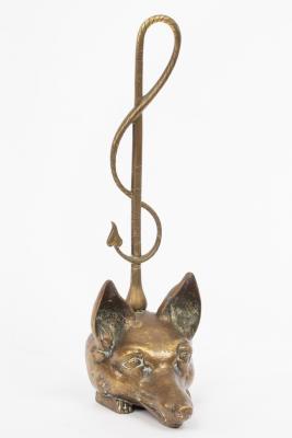A brass door porter modelled as a