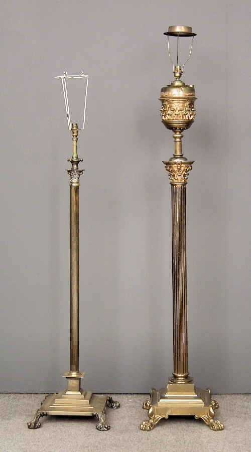 A brass electric standard lamp with
