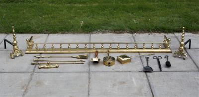 A brass fender, a pair of brass