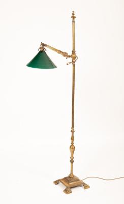 A brass floor standing reading