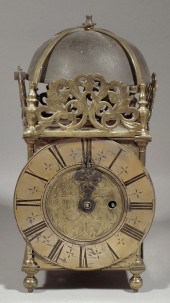 A brass framed lantern clock b