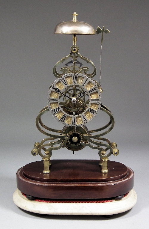 A brass framed ''Skeleton'' clock