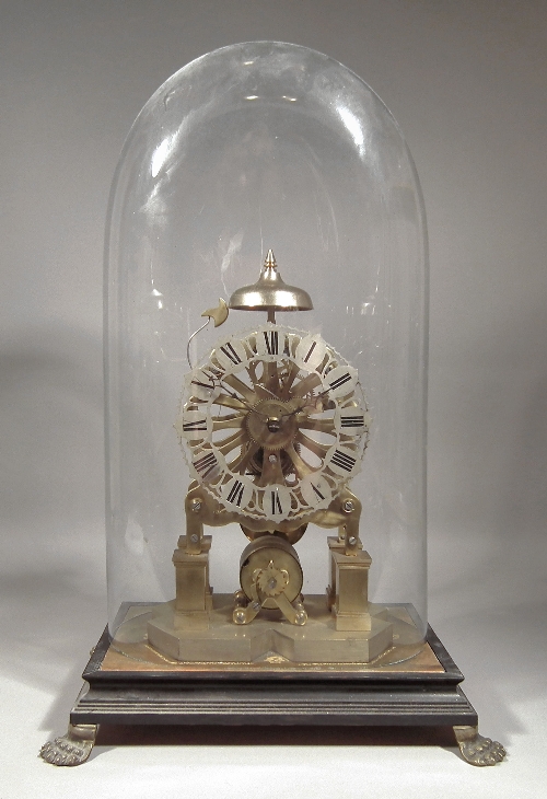 A brass framed skeleton timepiece