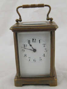 A brass French carriage clock