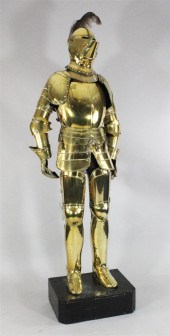 A brass full suit of armour in