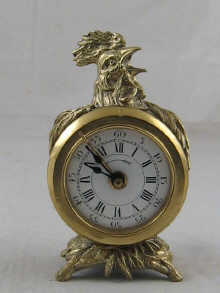 A brass German alarm clock with