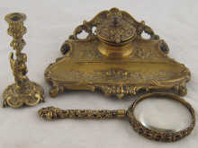 A brass inkstand 19 cm across