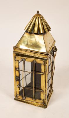 A brass lantern with glazed