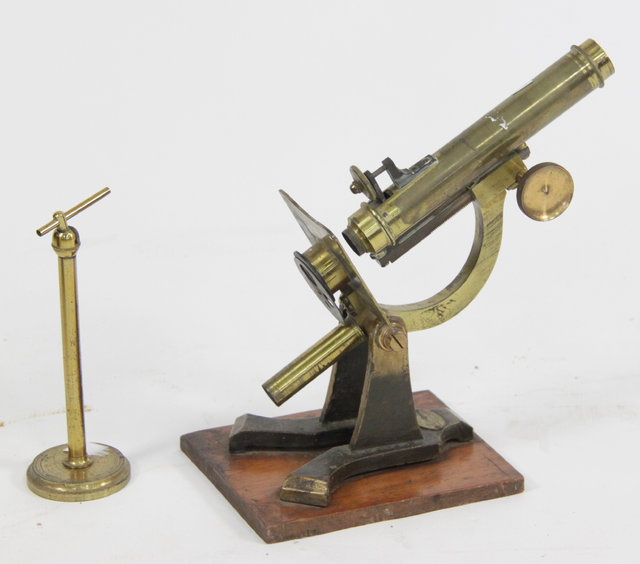 A brass microscope by J and C
