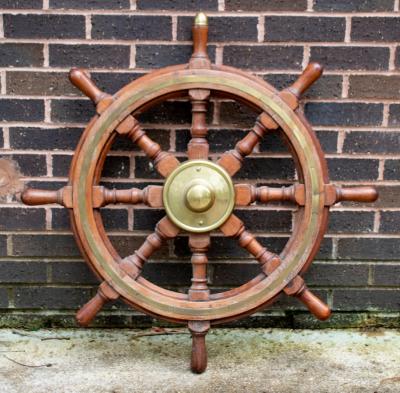 A brass mounted eight-point ships