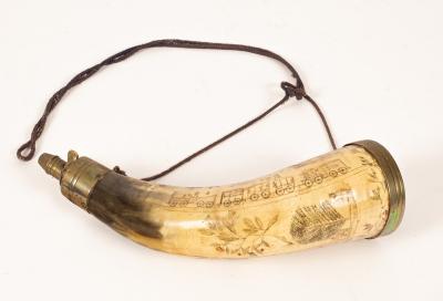 A brass mounted powder flask with
