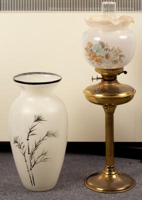 A brass oil lamp with opaque