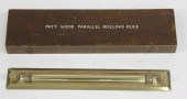 A brass parallel rolling rule