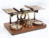 A BRASS POSTAL SCALEA brass po